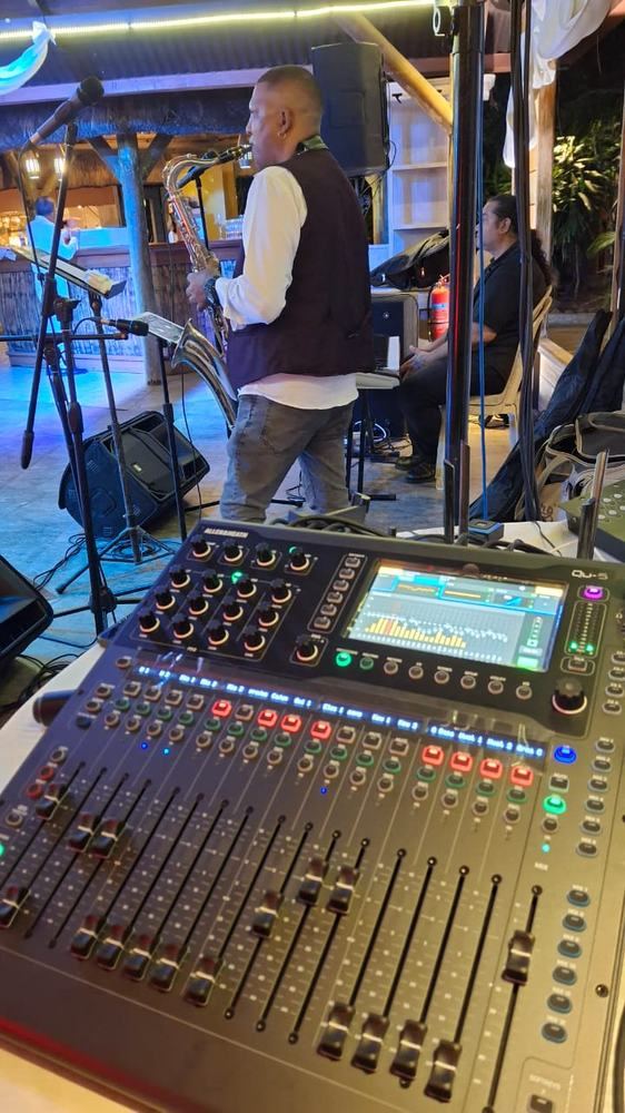 Live saxophonist with digital mixing desk