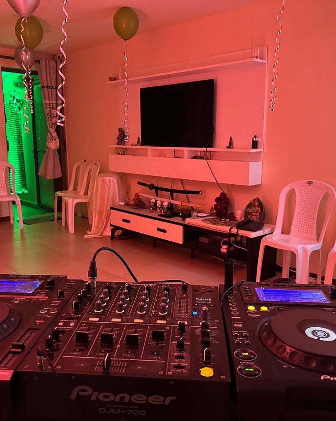 Home living room set up for a private celebration, Pioneer decks in foreground